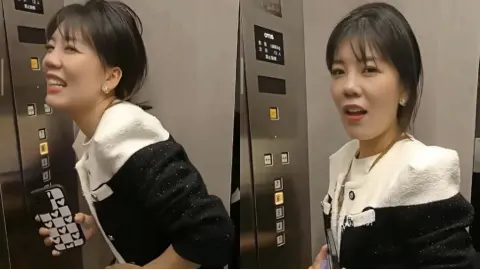 电梯少妇异常行为视频